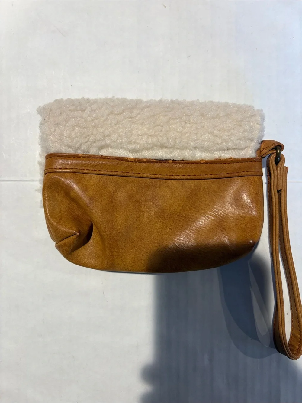 Shearling-Trim Wristlet Pouch in Camel and Cream